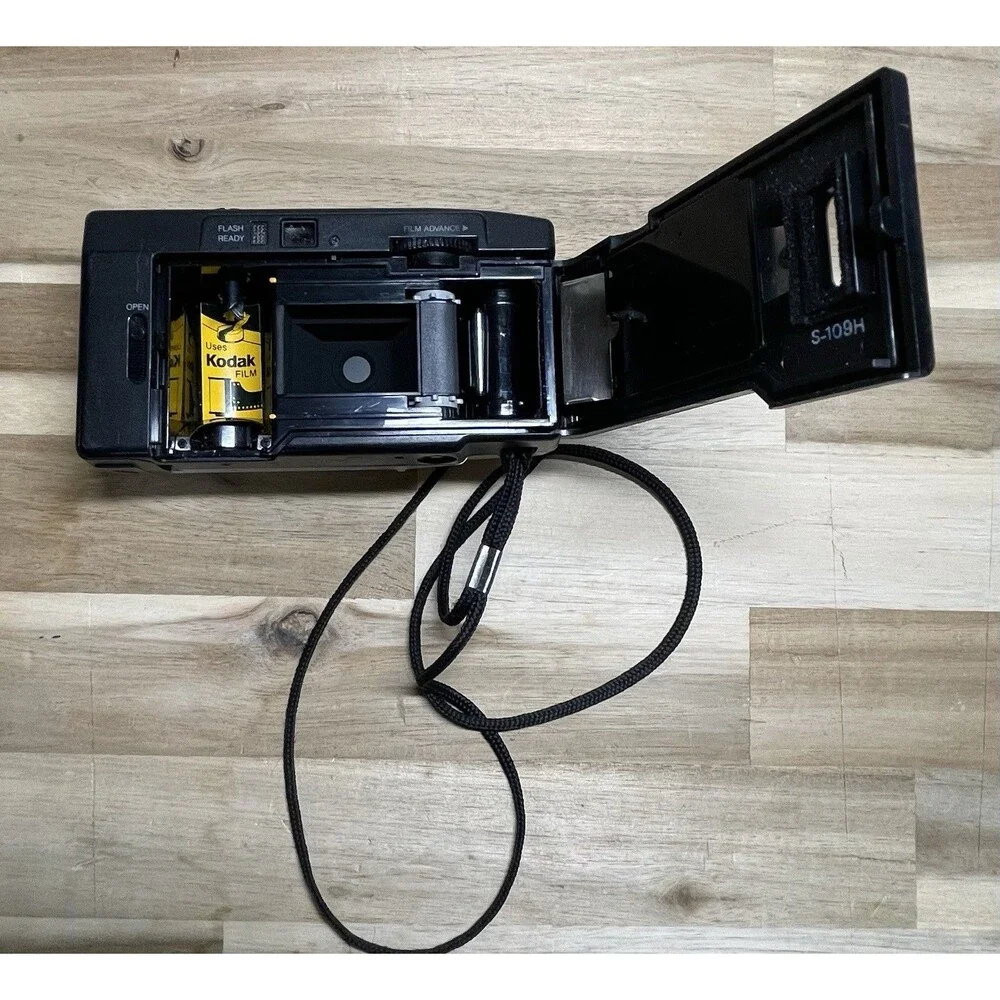 Kodak White Breeze Point-and-Shoot Camera with Black Strap and Pink Accents